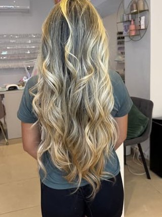Bright blonde balayage with long waves